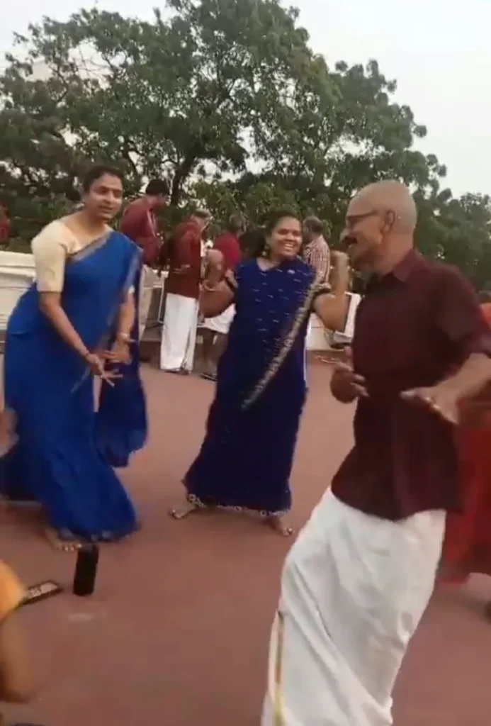 women-colleagues-dancing-outdoors-samarthana