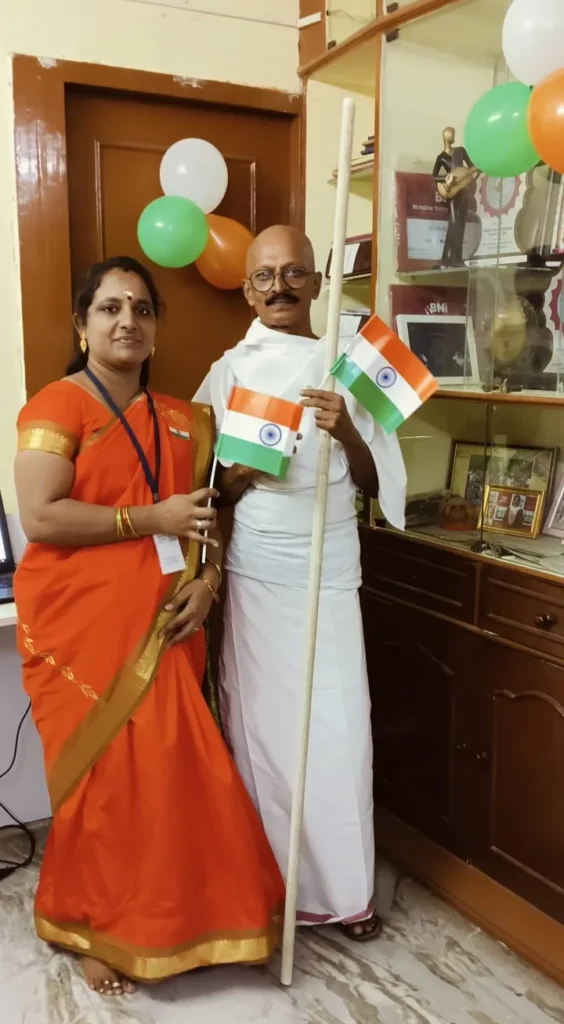 orange-saree-staff-portrait-samarthana