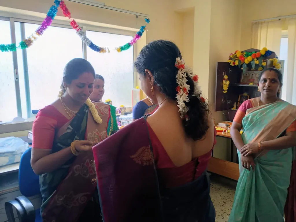 women-colleagues-in-traditional-attire-samarthana