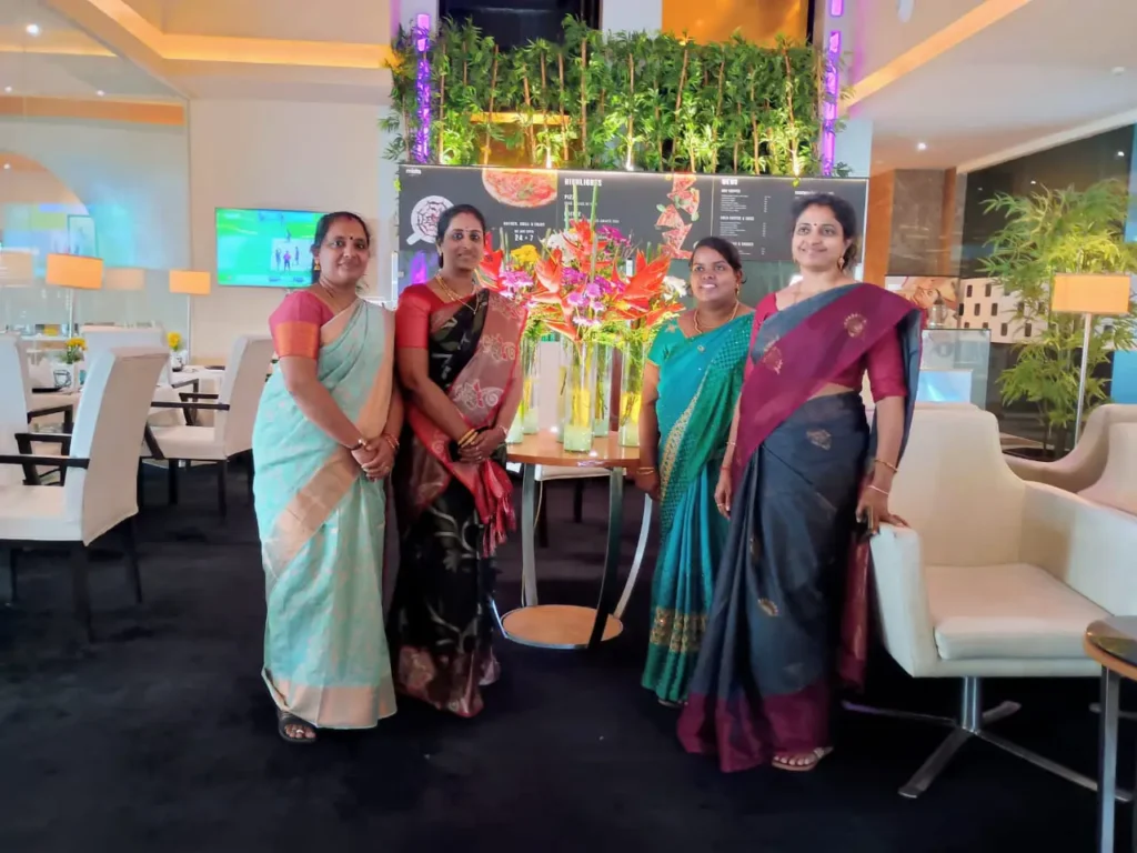 colleagues-posing-for-group-photo-samarthana