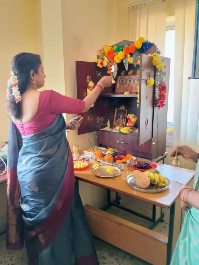 staff-member-arranging-celebration-table-samarthana