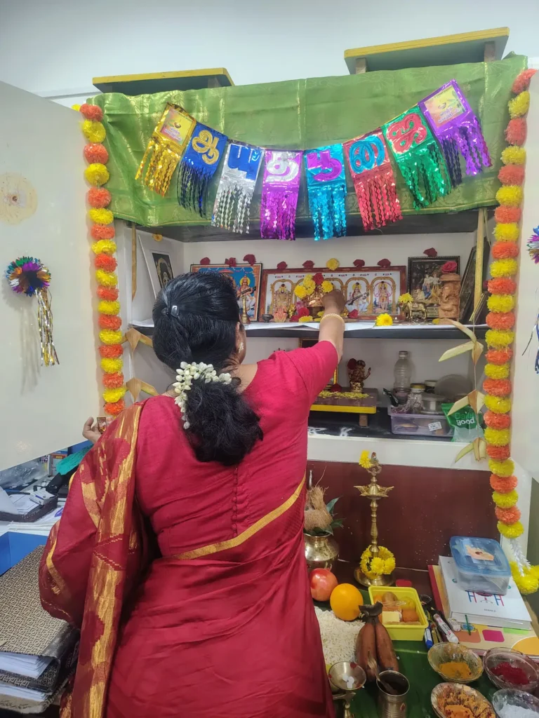 employee-decorating-prayer-altar-samarthana