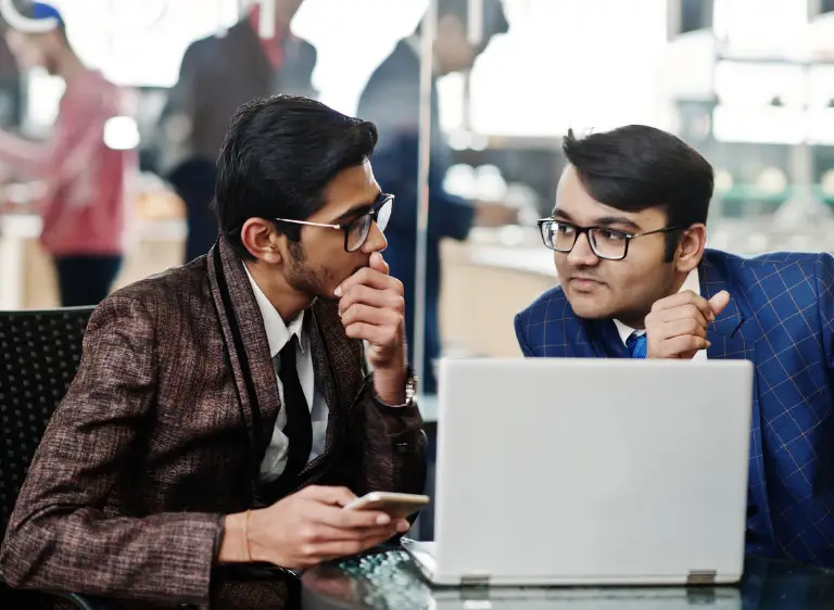 business-team-reviewing-checklist-samarthana-image