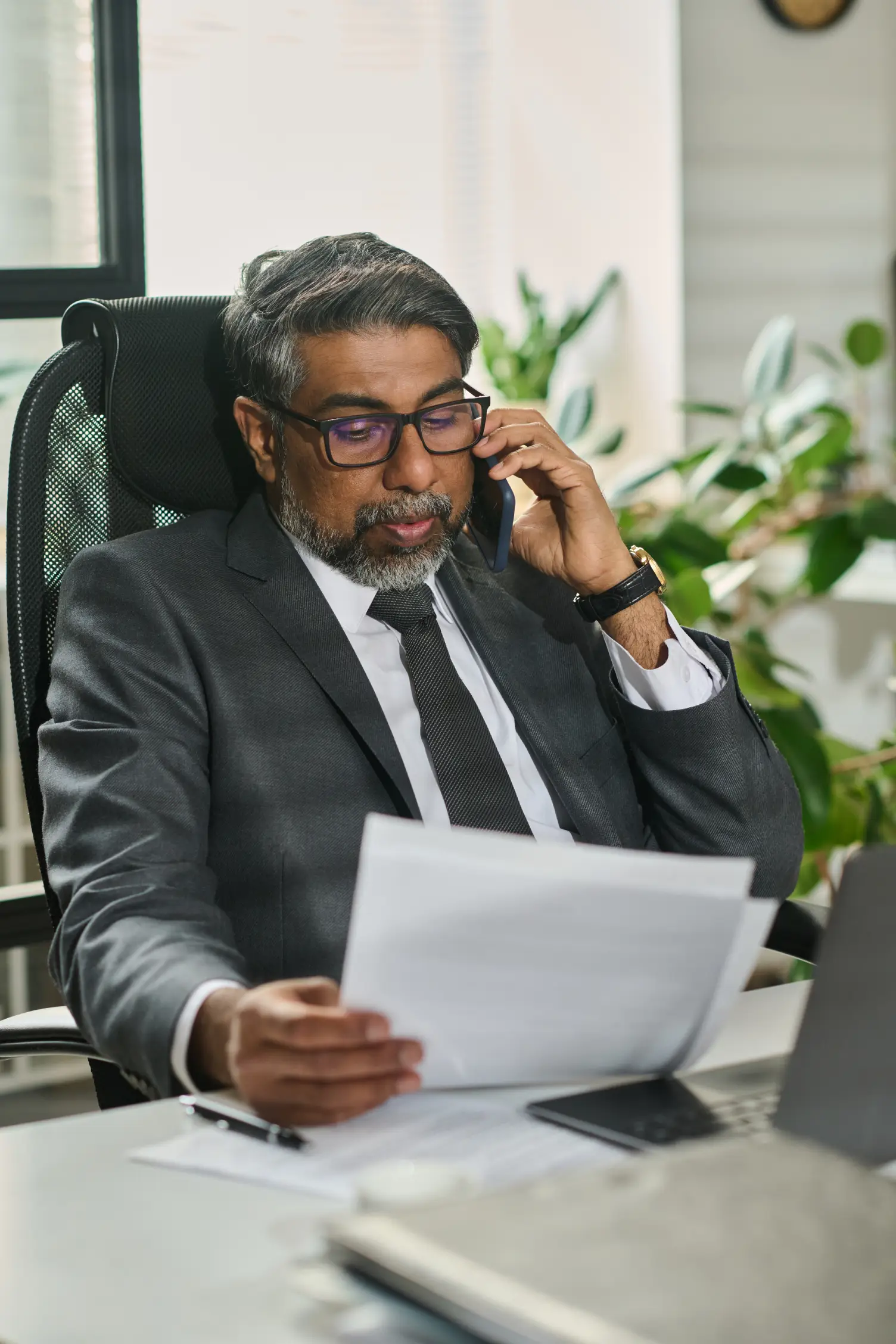 businessman-reviewing-compliance-documents-samarthana-image