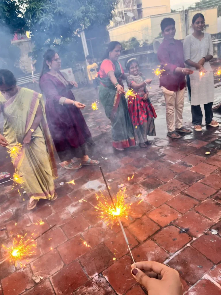 staff-celebrating-with-fireworks-samarthana