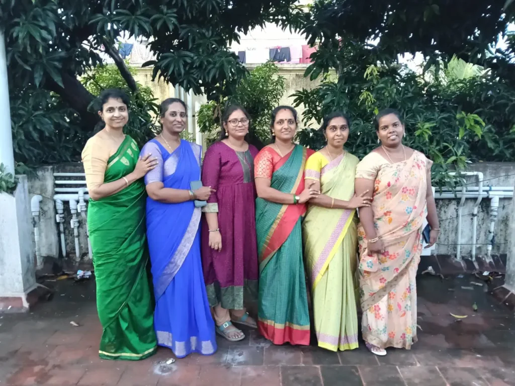 women-colleagues-in-colorful-sarees-samarthana