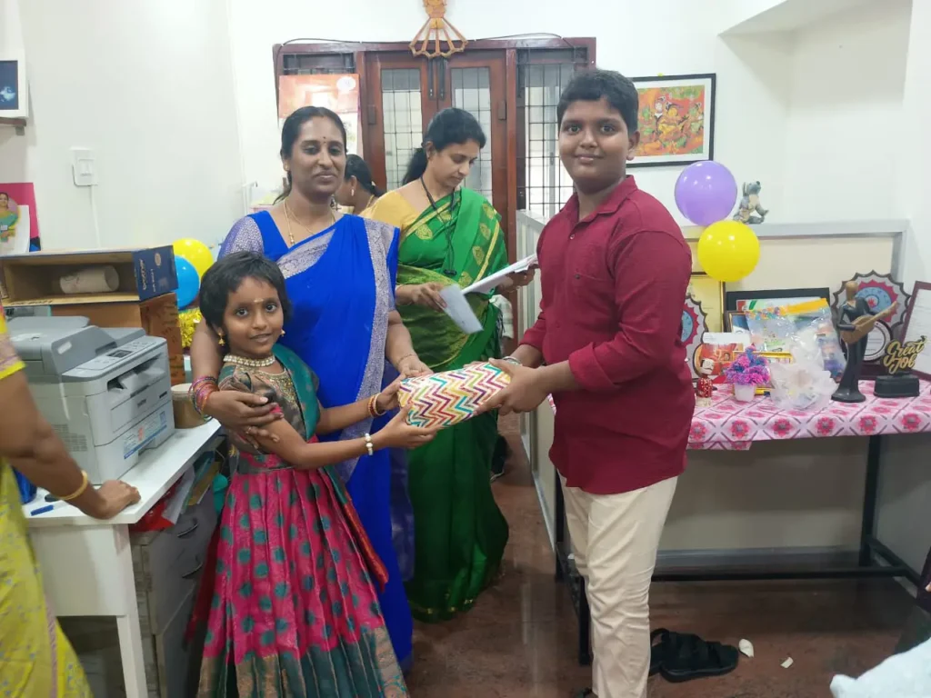 staff-members-exchanging-gifts-samarthana