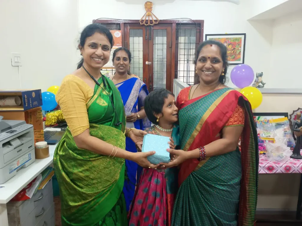 women-staff-presenting-festive-gift-samarthana