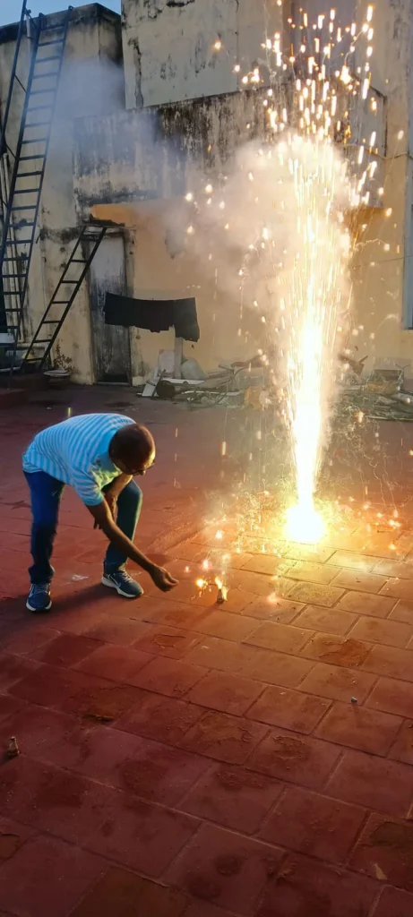 employee-lighting-fireworks-outdoors-samarthana