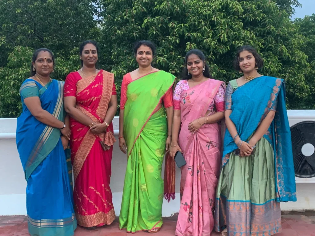 women-colleagues-in-bright-traditional-attire-samarthana