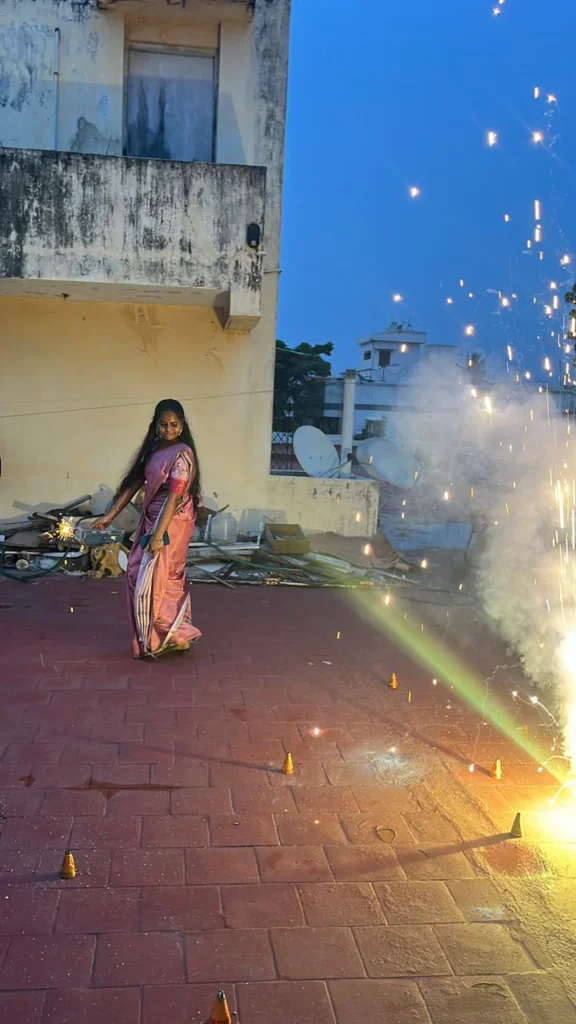 person-holding-sparkler-at-night-samarthana