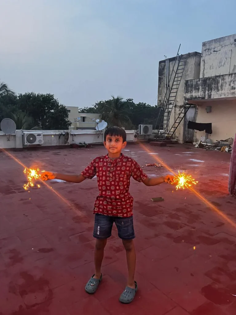 child-playing-with-ground-sparklers-samarthana