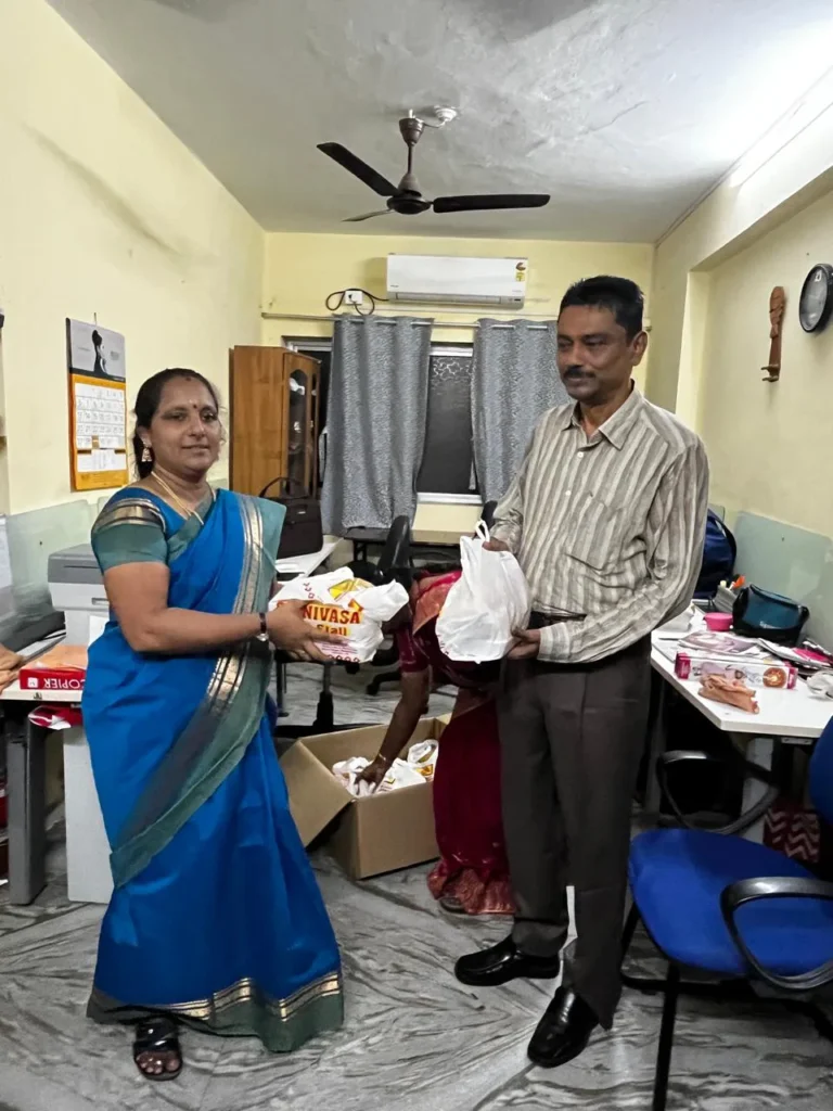 woman-employee-receiving-gift-samarthana