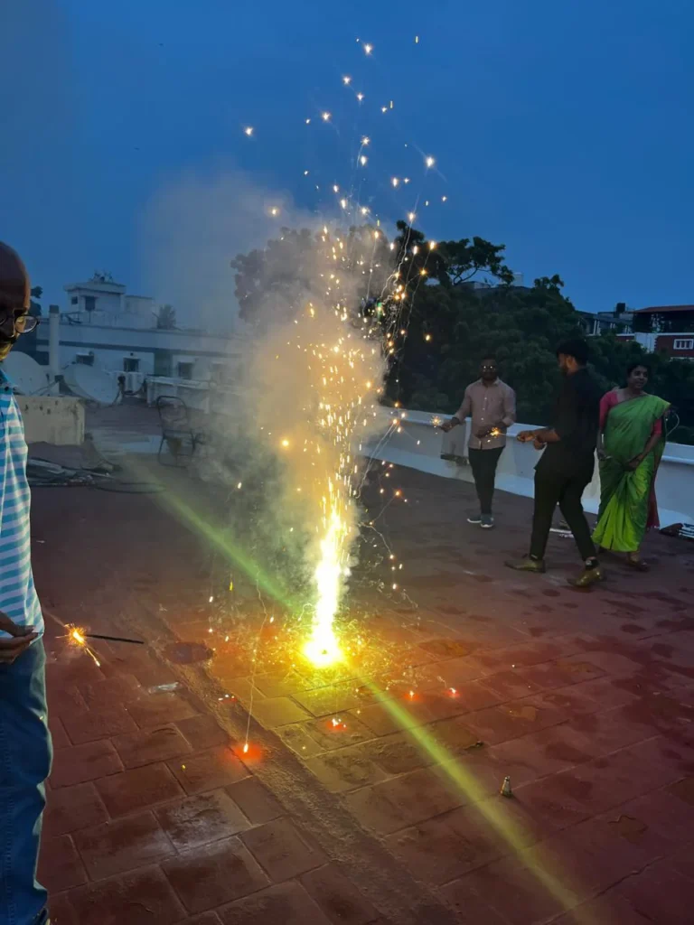 person-lighting-sparkler-outdoors-samarthana