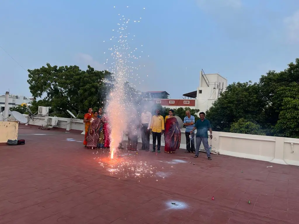 team-celebrating-diwali-with-fireworks-samarthana