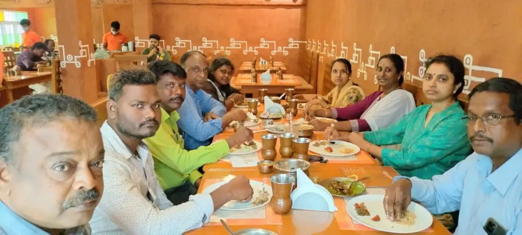 team-enjoying-lunch-at-dining-table-samarthana