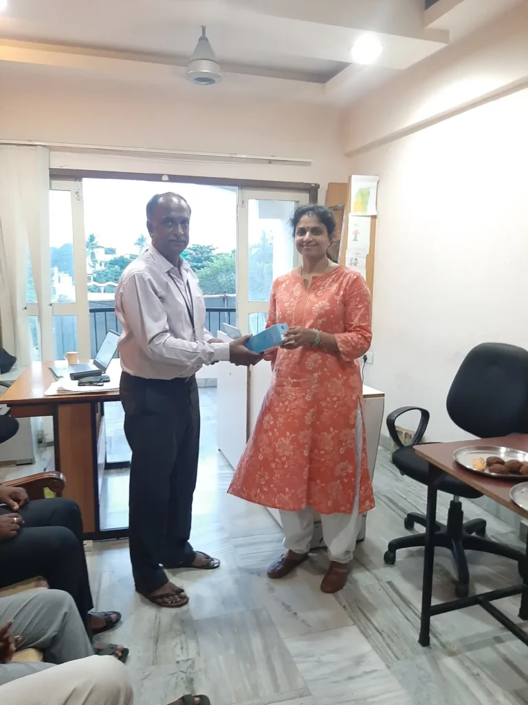 colleagues-standing-together-in-office-samarthana