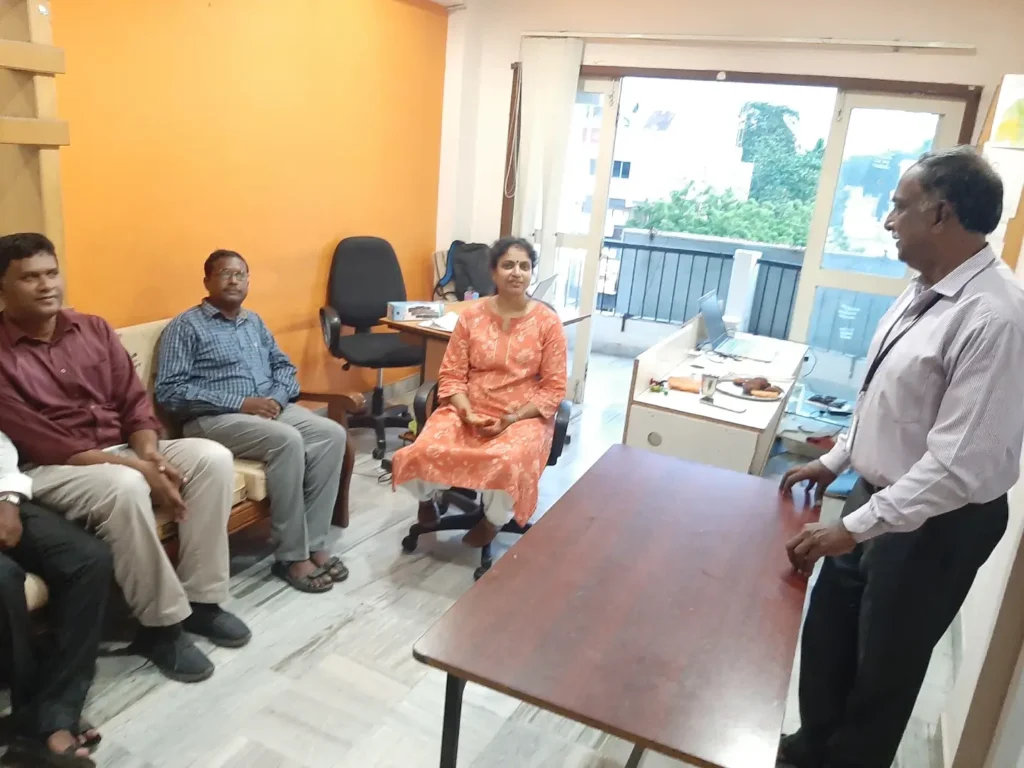 team-members-seated-during-office-meeting-samarthana