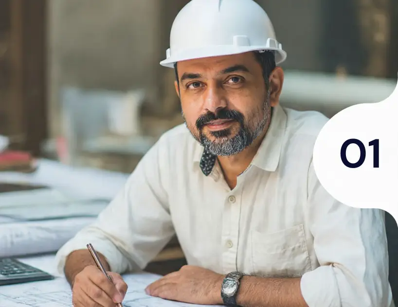 construction-professional-reviewing-documents-samarthana-image