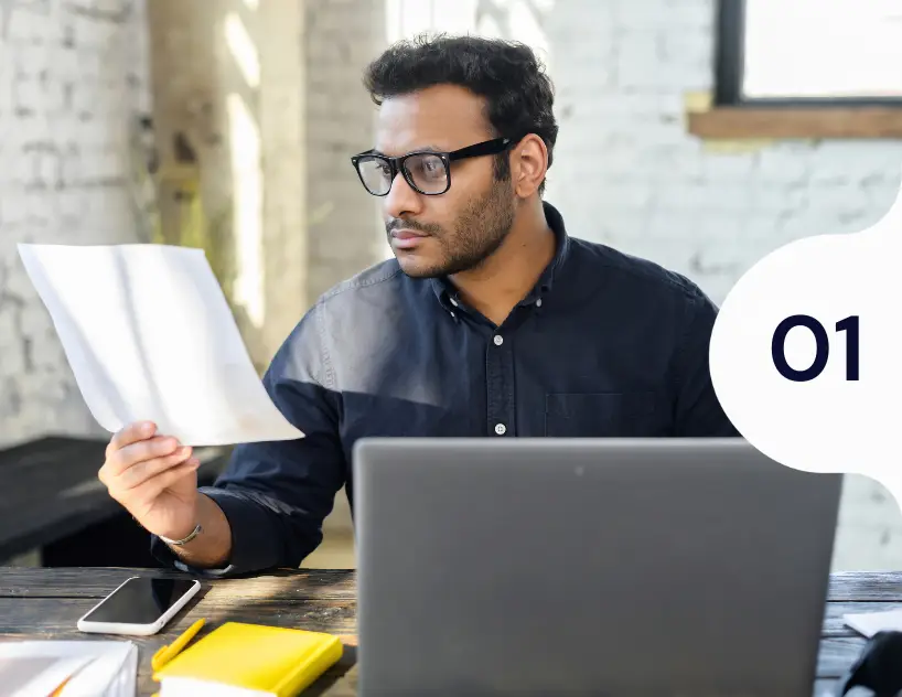 businessman-reviewing-inspection-documents-samarthana-image