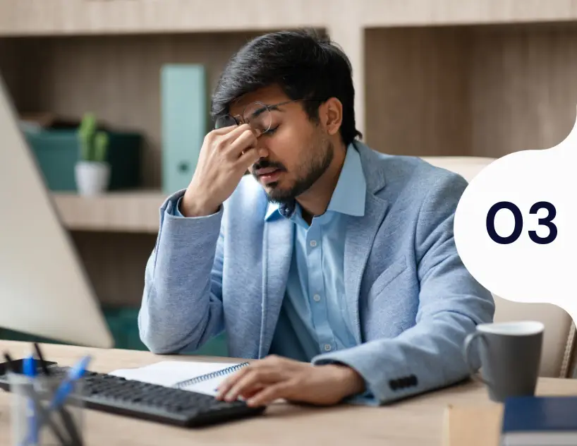 tired-businessman-rubbing-eyes-samarthana-image