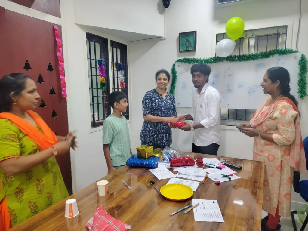 staff-members-enjoying-shared-meal-samarthana