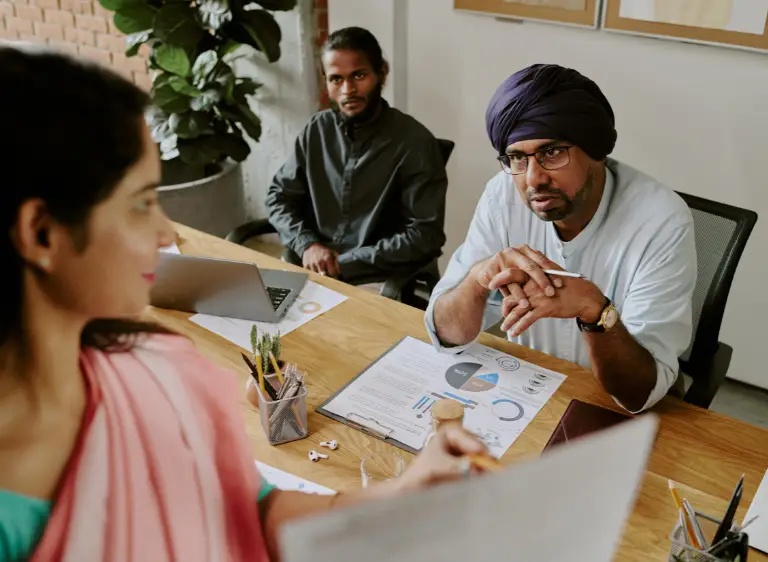 colleagues-discussing-business-strategy-samarthana-image