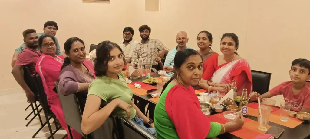staff-members-sharing-meal-at-table-samarthana