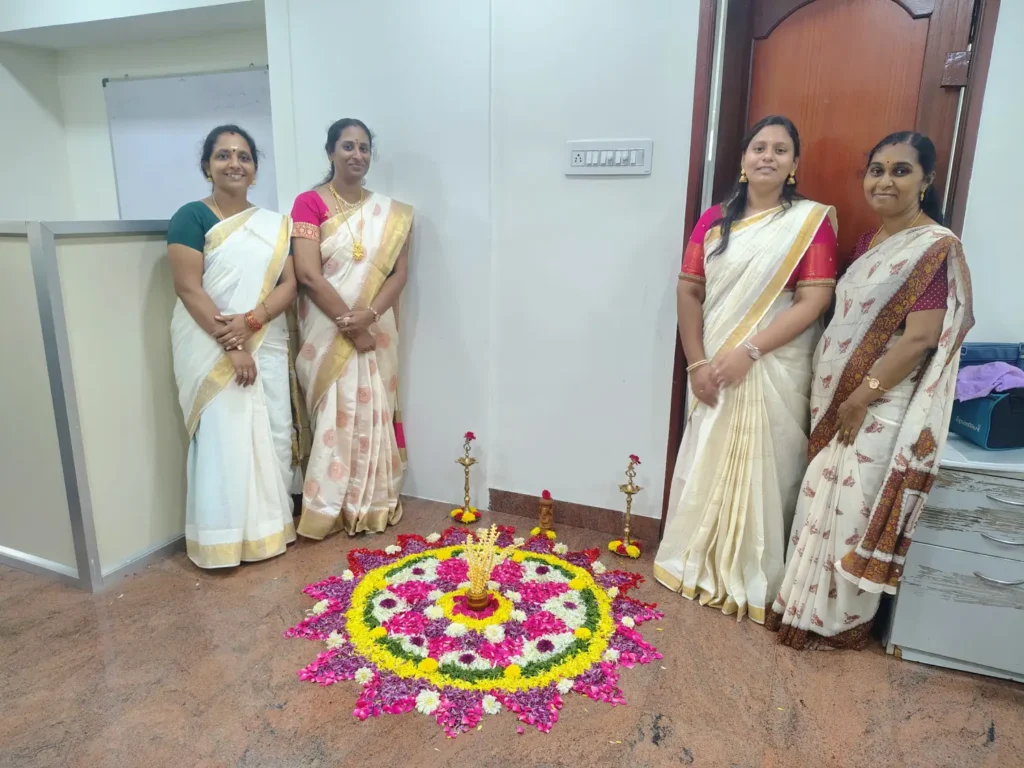 women-arranging-onam-flower-decoration-samarthana