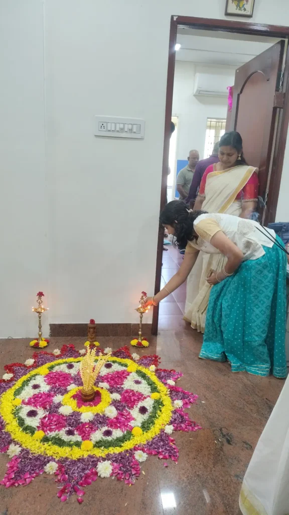 staff-members-making-colorful-pookalam-samarthana