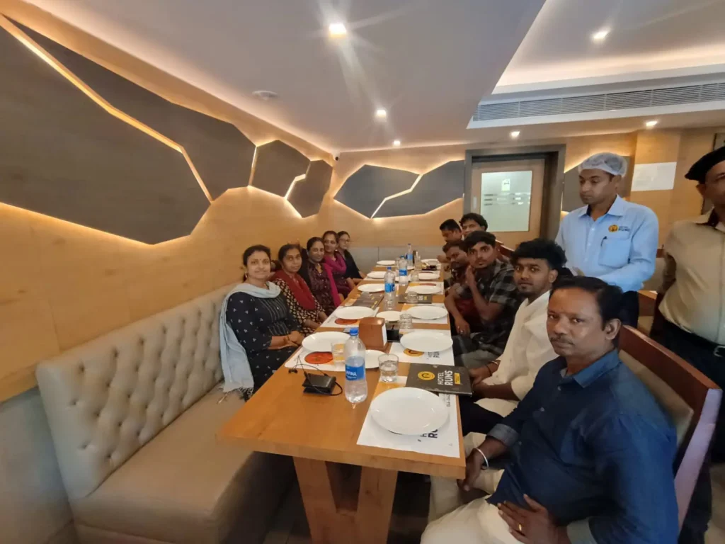 colleagues-having-meal-at-restaurant-samarthana